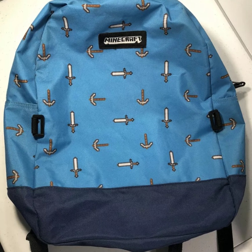 Minecraft Backpack Blue Pickax & Sword Backpack in good condition